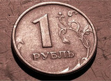 Официальный курс рубля немного прибавил в весе