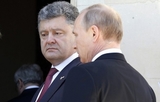 Путин обсудил с Порошенко режим прекращения огня в Донбассе