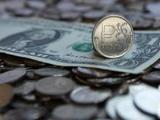 Центробанк повысил официальный курс рубля на пятницу