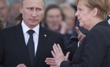 Меркель рассказала о давлении Путина на ополченцев