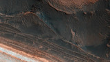 NASA показало фото меняющей поверхность Марса ледяной лавины