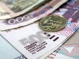 Официальный курс рубля значительно укрепился к доллару и евро