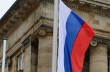 Над захваченными зданиями в Крыму подняли российские флаги