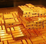 Обвал рубля привел к падению мировых цен на золото