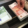 Торги на бирже открылись укреплением рубля к доллару