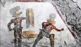 В Помпеях обнаружили необычную фреску с изображением гладиаторов