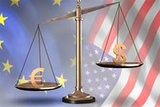 Евро упал до двухлетних минимумов по отношению к доллару