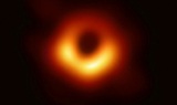 Ученые показали первую реальную фотографию черной дыры