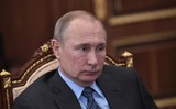 Путин подписал закон о снятии наличных с анонимных карт