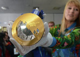 Во сколько оценивается золотая олимпийская медаль?