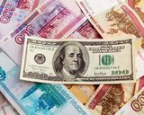 ЦБ повысил курс рубля к евро и понизил к доллару