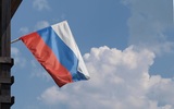 Американец развернул российский флаг на открытии Олимпиады