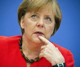 В мигранте на селфи с Меркель узнали террориста Лахрауи