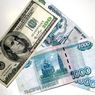 ЦБ повысил курс рубля к евро и доллару