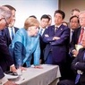 СМИ рассказали, как Трамп швырнул в Меркель конфетами на саммите G7