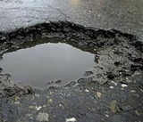 Путин обнаружил черные дыры российских дорог