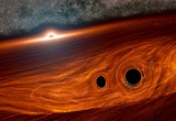 Ученые впервые увидели вспышку от столкновения двух черных дыр