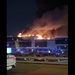 Подмосковный "Крокус Сити Холл" загорелся после атаки террористов