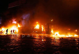 В Киеве от зажженных протестующими автопокрышек вспыхнул дом