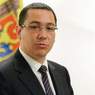 Премьер Румынии лидирует в первом туре выборов президента