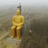 В Китае снесли 36-метровую "золотую" статую Мао Цзэдуна через три дня после установки