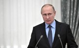 Путин поблагодарил членов правительства и отметил "огромную заслугу" Медведева