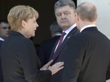 Порошенко и Меркель обсудили прекращение огня в Донбассе