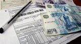 Долги по ЖКХ будут снимать со счетов и банковских карт