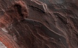 Ученые показали огромную ледяную лавину на Марсе